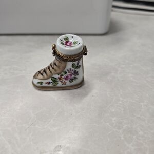 Limoges boxes are highly coveted collectibles Floral Porcelain Boot Trinket Box